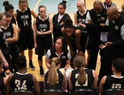 Penn Coach Kristi Ulrich with the Penn Girls Basketball team