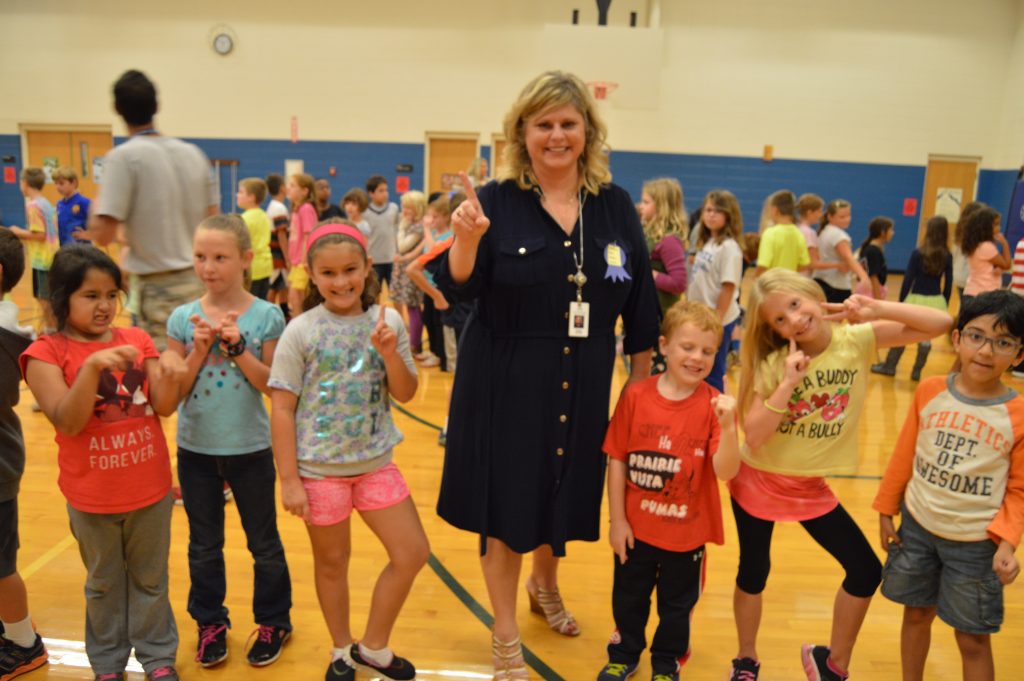 Principal Twibell with students