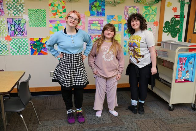 Students sitting at desks in a classroom.