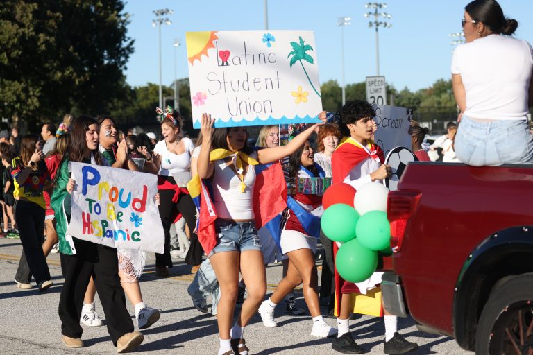 Students in Penn Homecoming parade