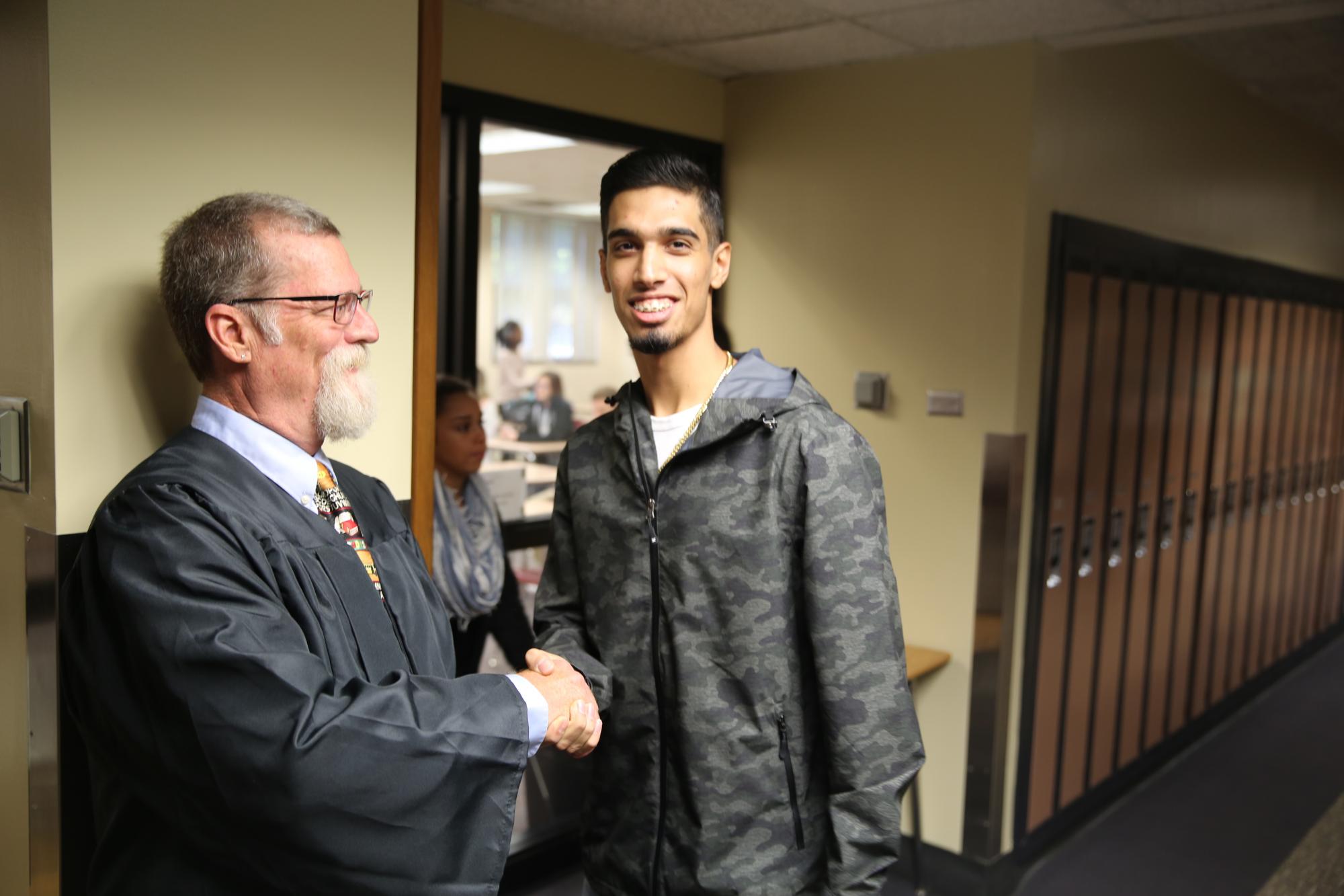 Early College Academy Faculty Member Jim Schmidt welcomes students back