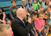 Madison Principal Kevin McMillen admires student's 1st Day of School haircut